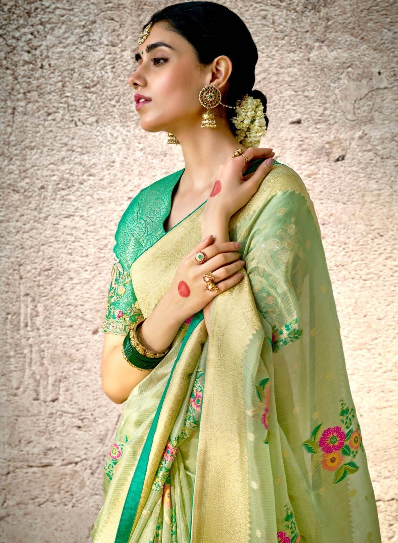 Pastel Green Kora Banarasi Saree With Delicate Floral Patterns