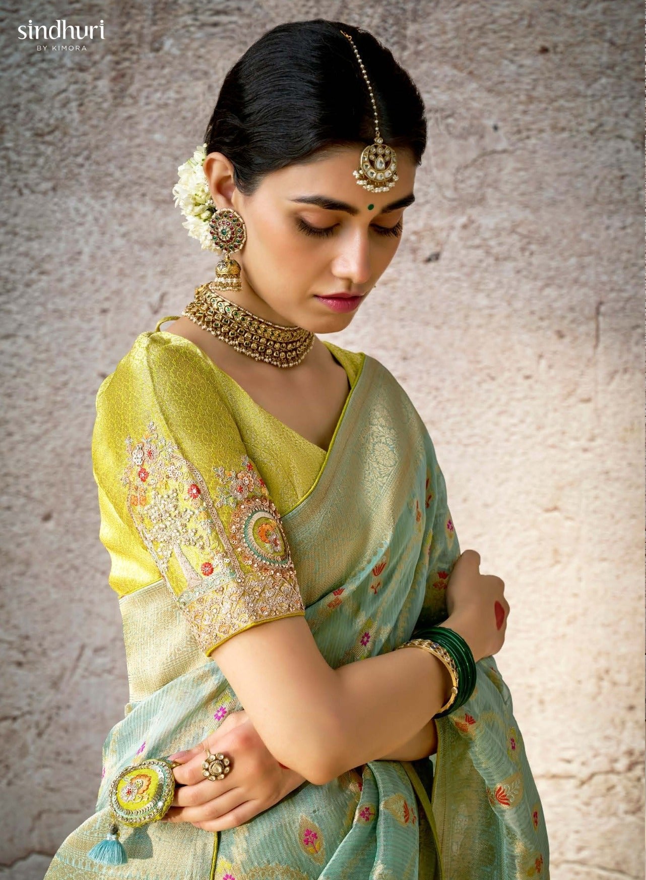 Pistachio Green Kora Banarasi Saree With Delicate Floral Patterns