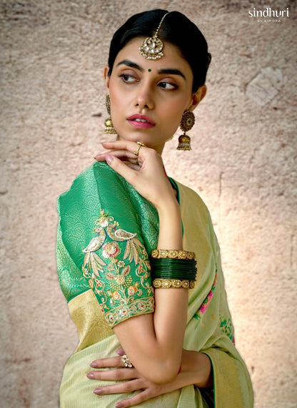 Pastel Green Kora Banarasi Saree With Delicate Floral Patterns
